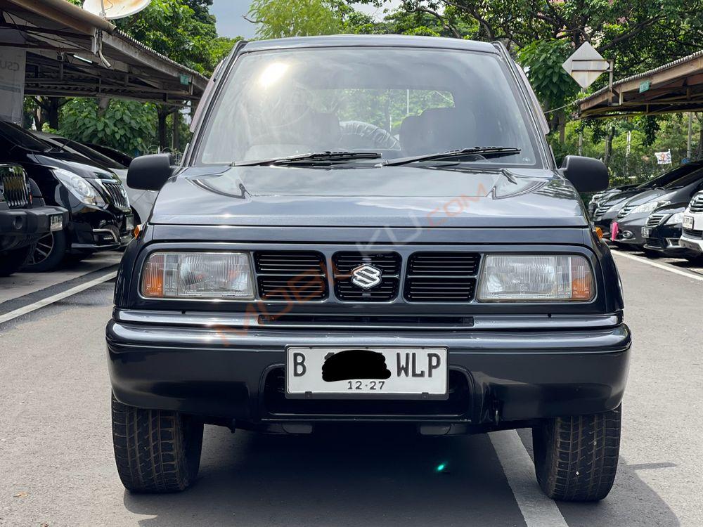 Mobil Suzuki Sidekick 1997