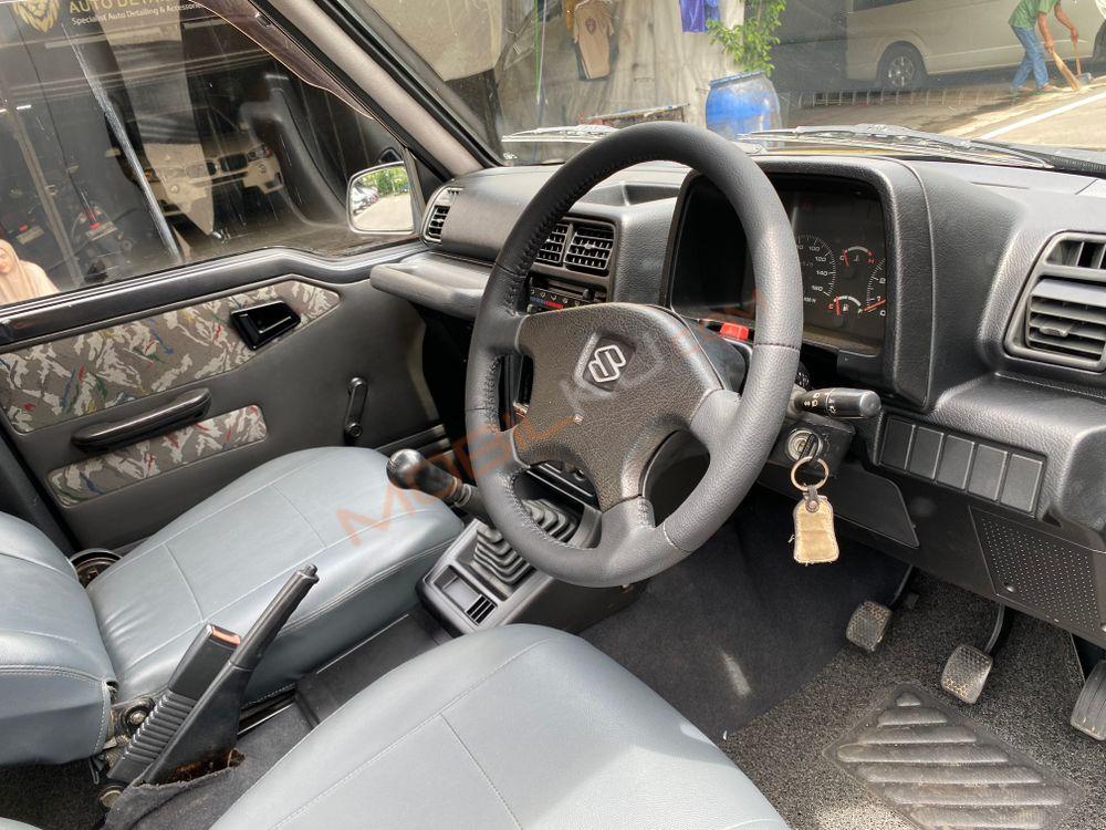 Mobil Suzuki Sidekick 1997