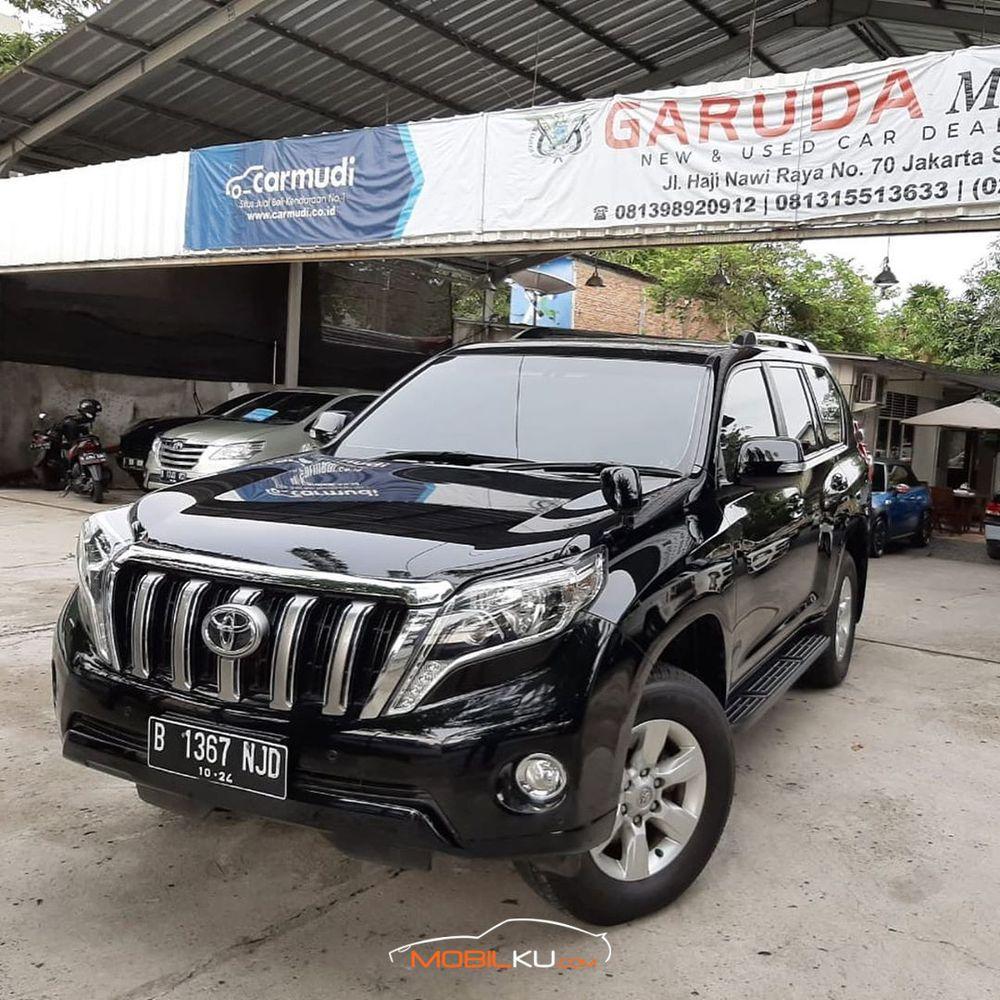 Mobil Toyota Land Cruiser 2014