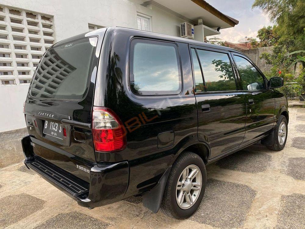 Mobil Isuzu Panther 2014