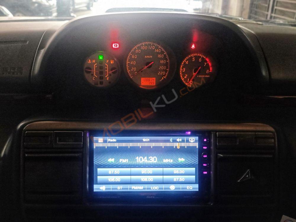 Mobil Nissan X-Trail 2004