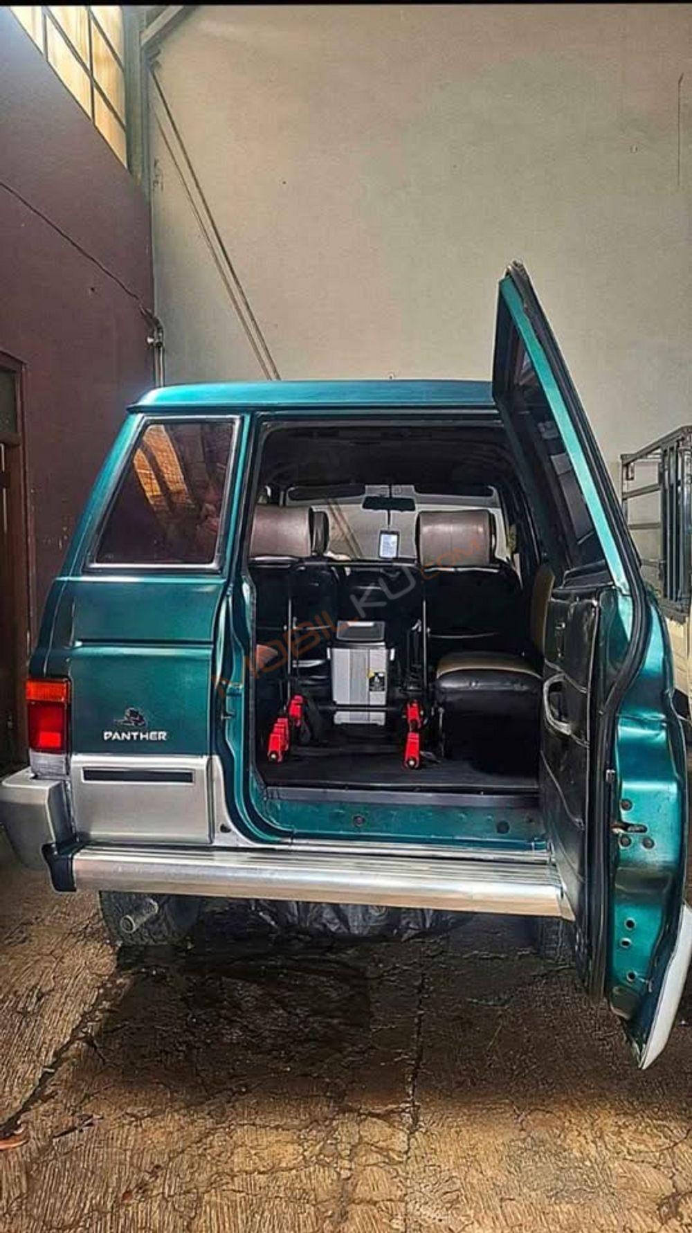 Mobil Isuzu Panther 1999