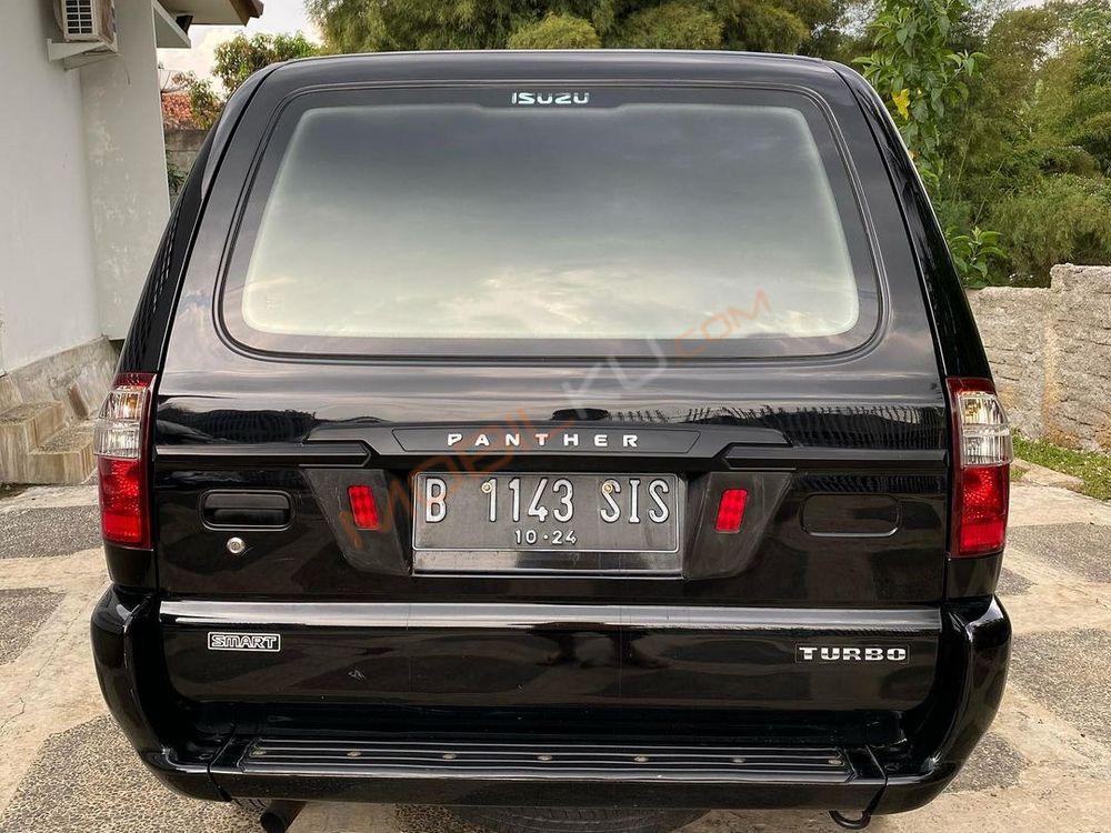 Mobil Isuzu Panther 2014