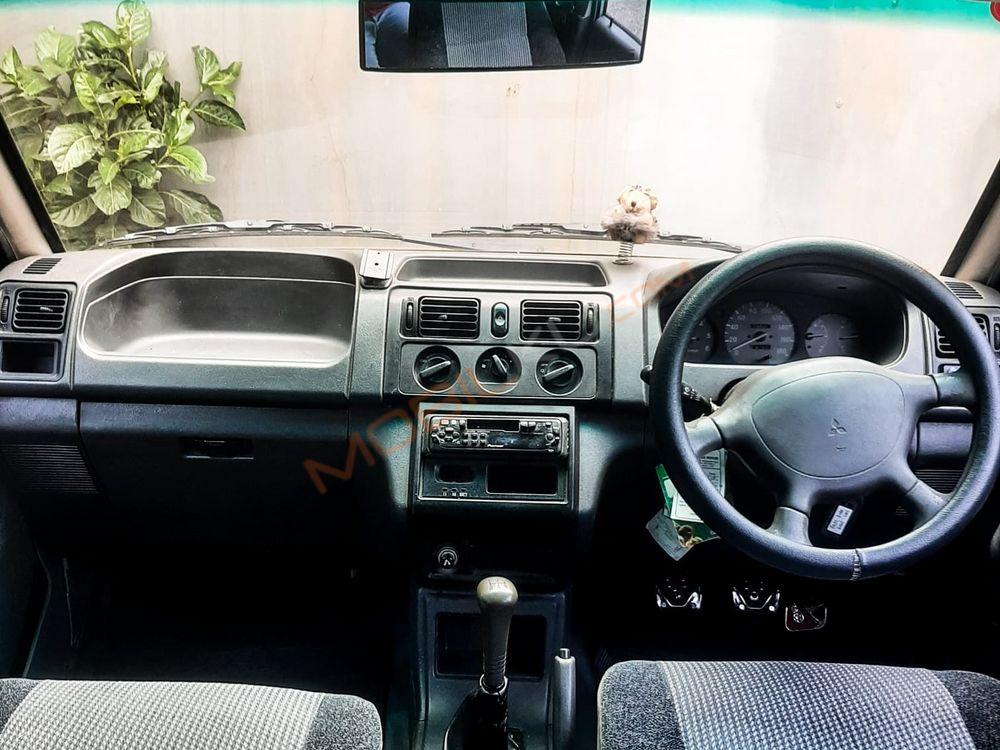Mobil Mitsubishi Kuda 2003