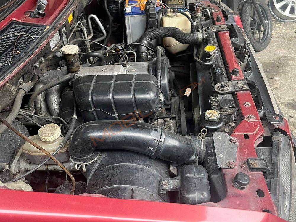 Mobil Mitsubishi Kuda 2002