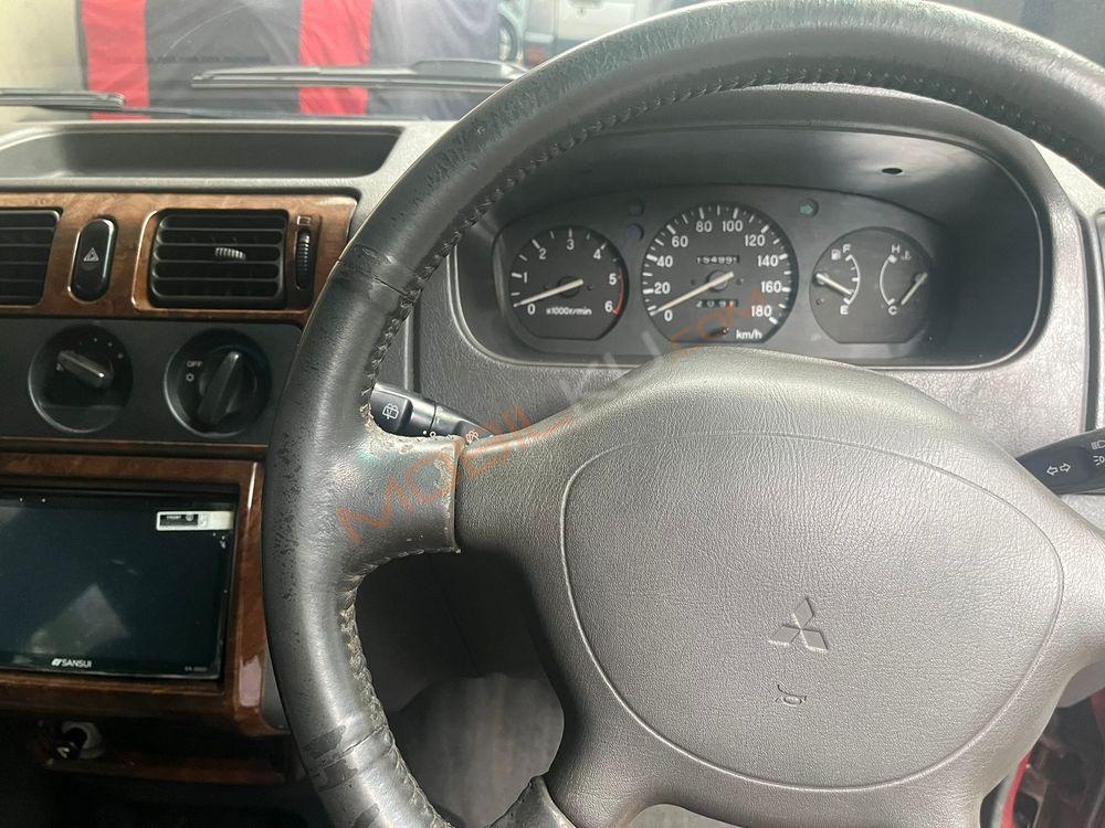 Mobil Mitsubishi Kuda 2002