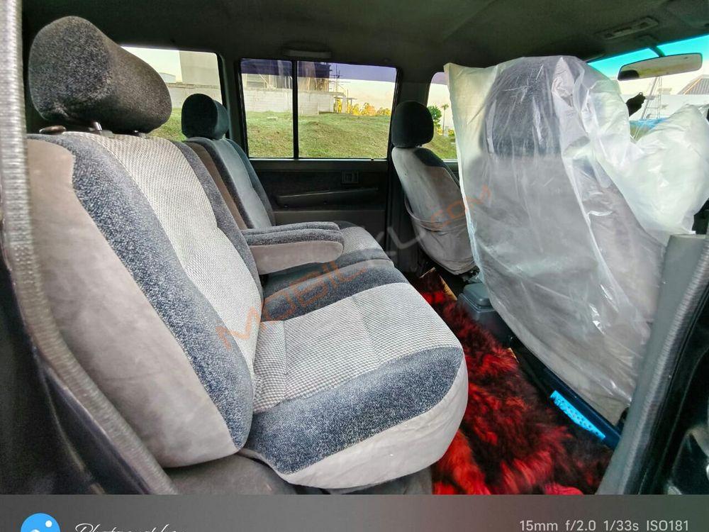 Mobil Mitsubishi Kuda 2003