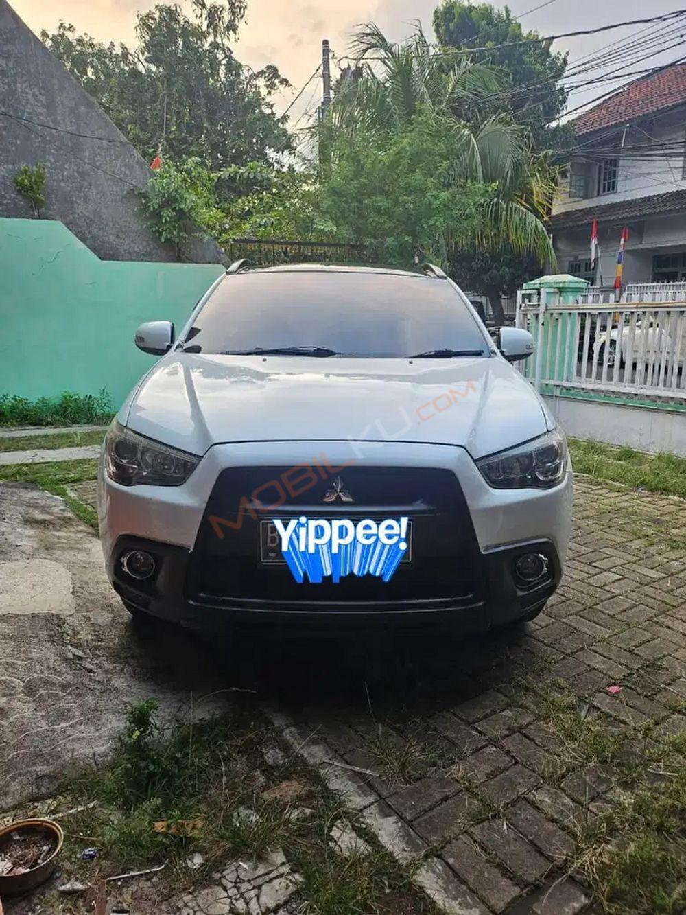 Mobil Mitsubishi Outlander Sport 2013