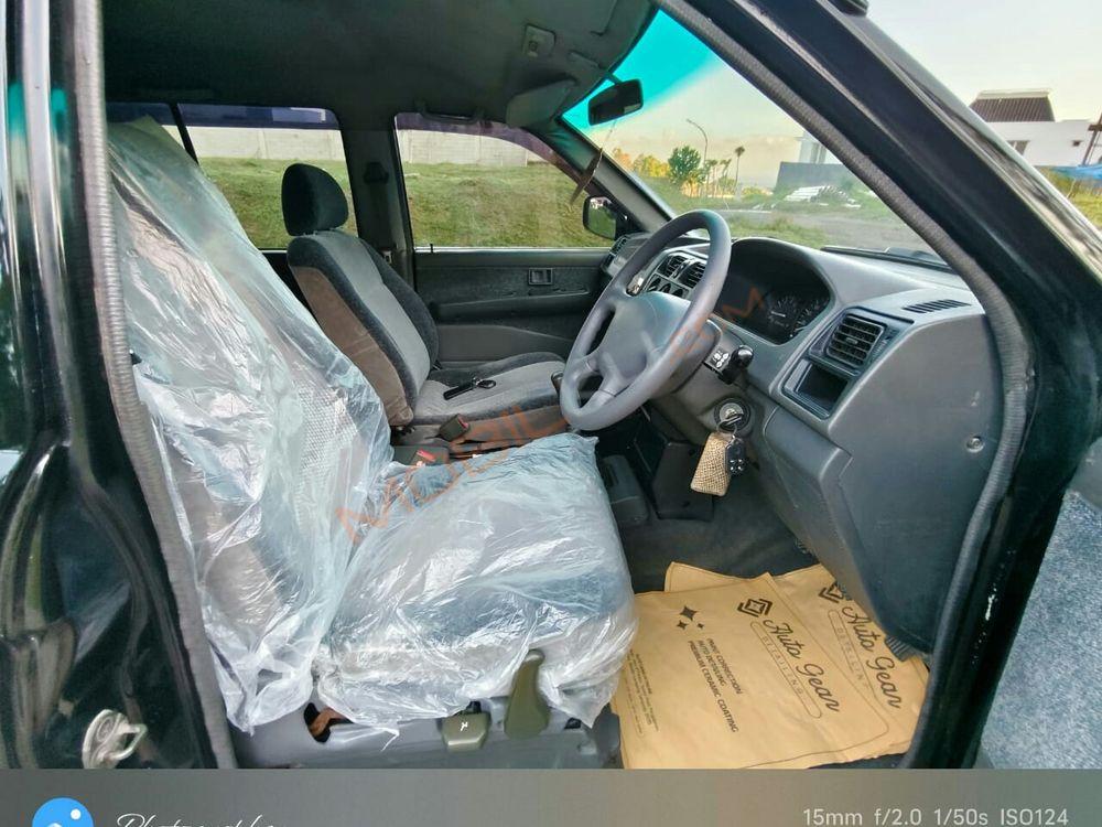 Mobil Mitsubishi Kuda 2003