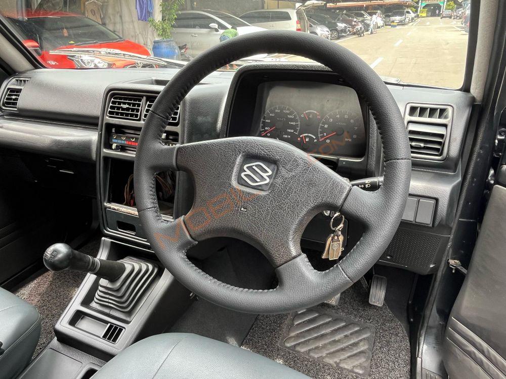 Mobil Suzuki Sidekick 1997