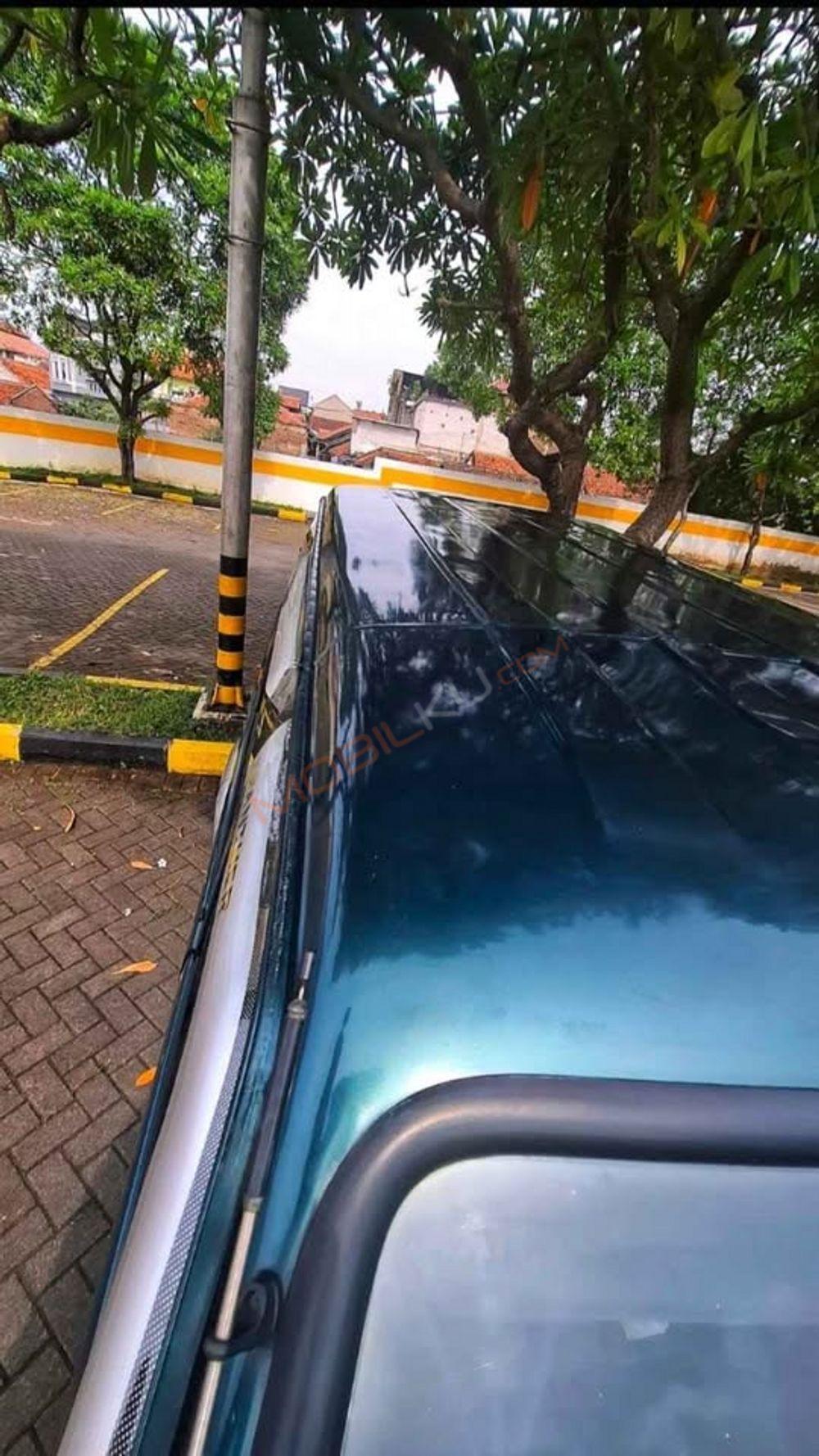 Mobil Isuzu Panther 1999