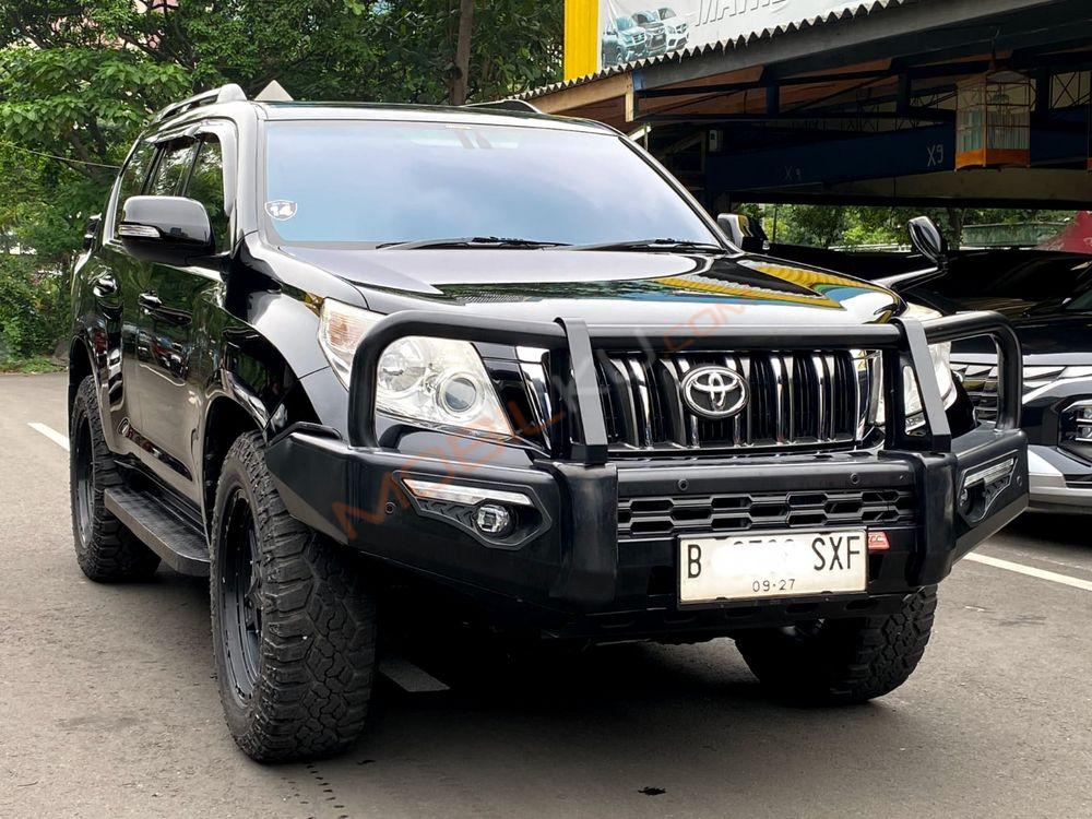 Mobil Toyota Land Cruiser 2013