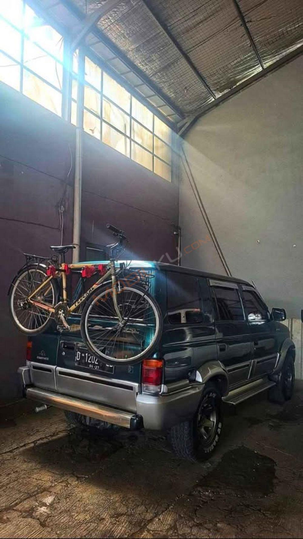 Mobil Isuzu Panther 1999