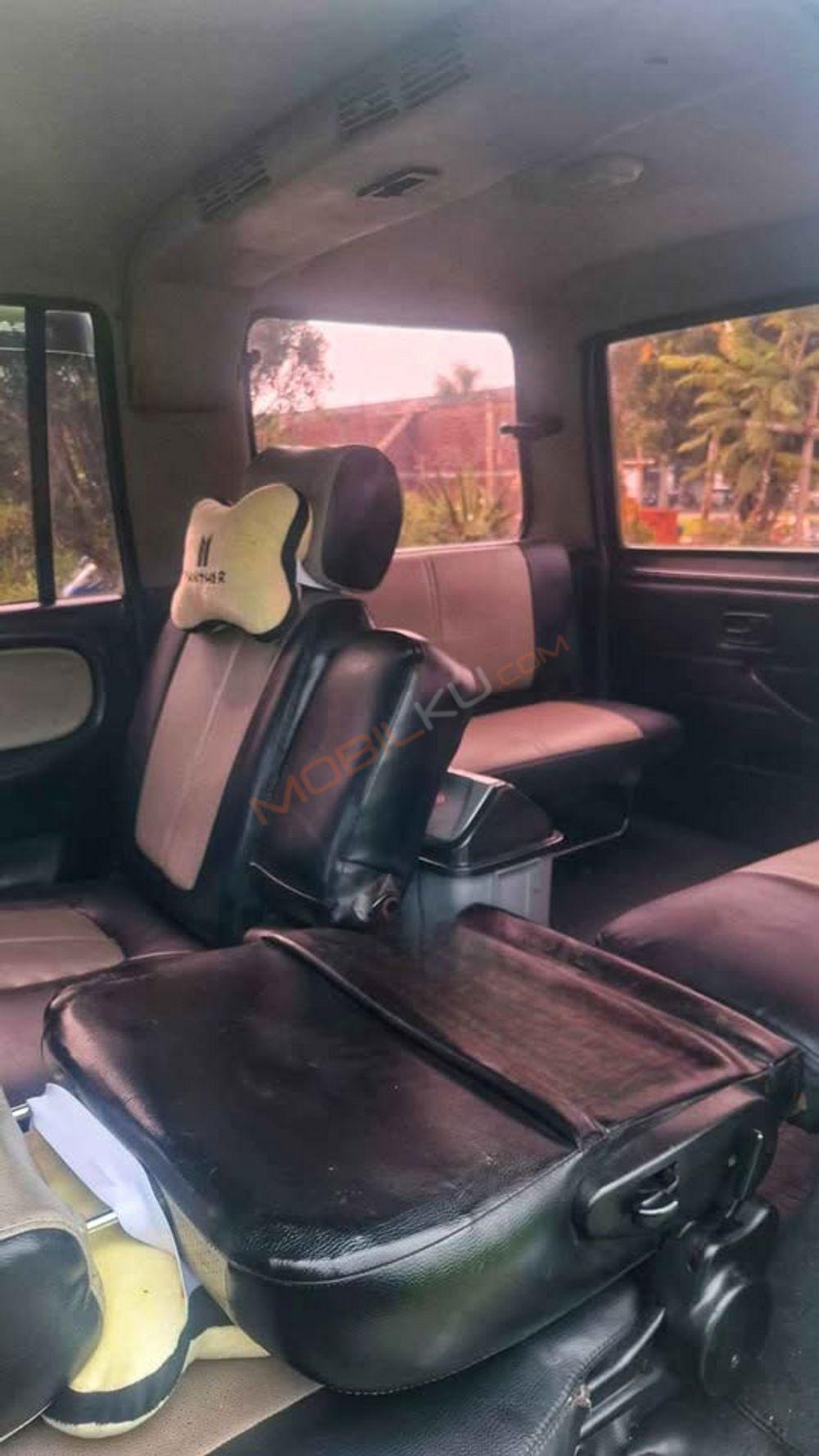 Mobil Isuzu Panther 1999