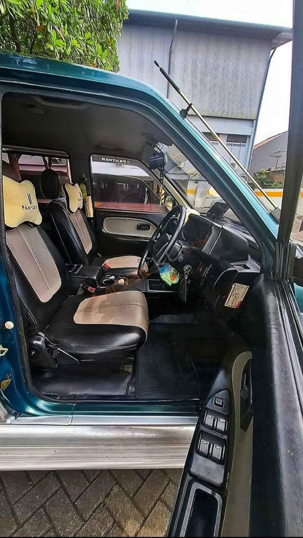 Mobil Isuzu Panther 1999